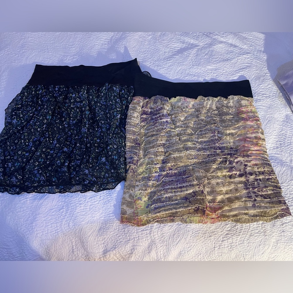 Two patterned Medium Skirts. Like New. Elastic Waistband. Trendy.